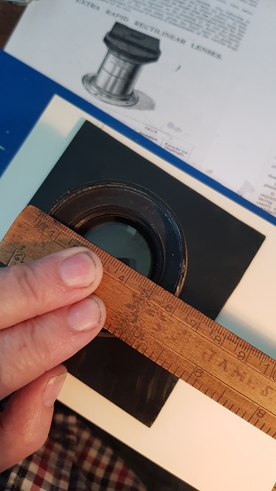 Measuring the lens for the new lens cap